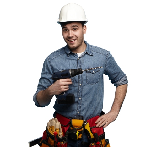 Worker in denim shirt holding power drill.