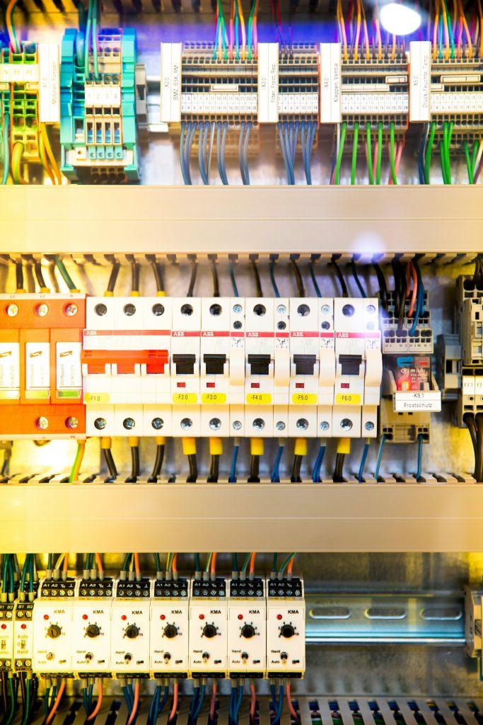 Electrical panel with switches, circuits, and wiring.