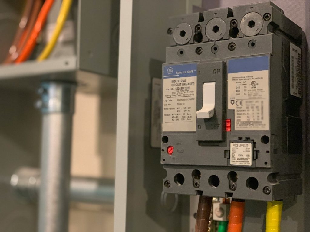 Industrial circuit breaker with electrical wiring.